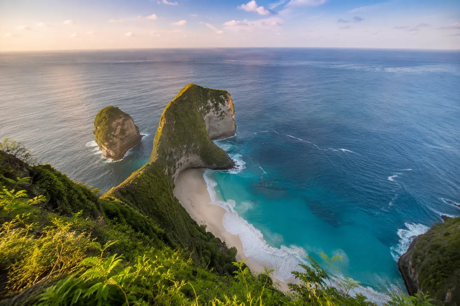 Aerial view of Kelingking Beach on Nusa Penida, a highlight of Bali island tours